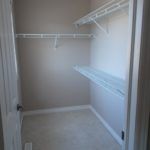 Walk in closet with shelving