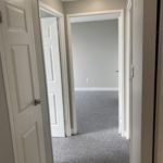 Carpeted Hallway Apartment